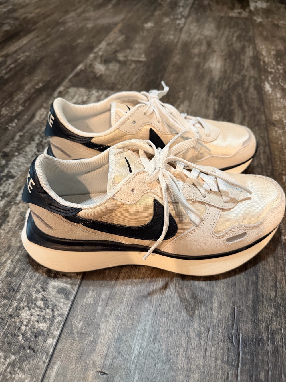 Nike Cream and Black Low-Top Swoosh Sneakers